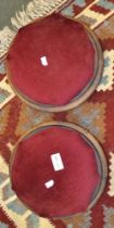 A pair of Victorian circular pad topped foot stools