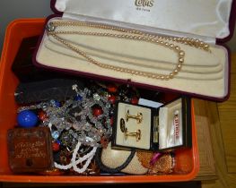 A box containing a large selection of costume jewellery