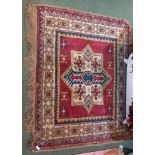 An antique Turkish Kars Kazak woven woollen rug 97 130 cm