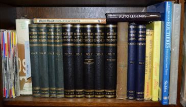 A shelf of hard back books mainly relating to motoring