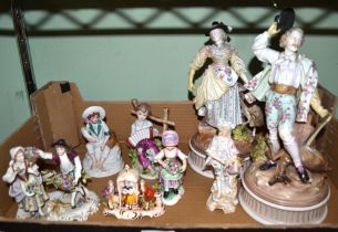 A collection of European porcelain figures some with 'blue crossed swords'