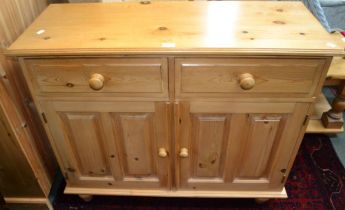 A modern pine dresser base/sideboard, two drawers with cupboard