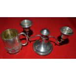 A silver mug, and candelabra