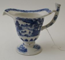 A Chinese porcelain, helmet shaped creamer, blue on white landscape decoration, possibly Qianlong,