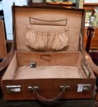 A vintage leather vanity case