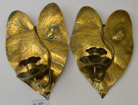 A pair of Arts and Crafts brass wall sconces of Lily pad design, each embossed with a frog and insec
