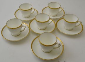 A set of six Minton bone china coffee cups and saucers, "Golden Heritage" pattern H-5183, white, wit