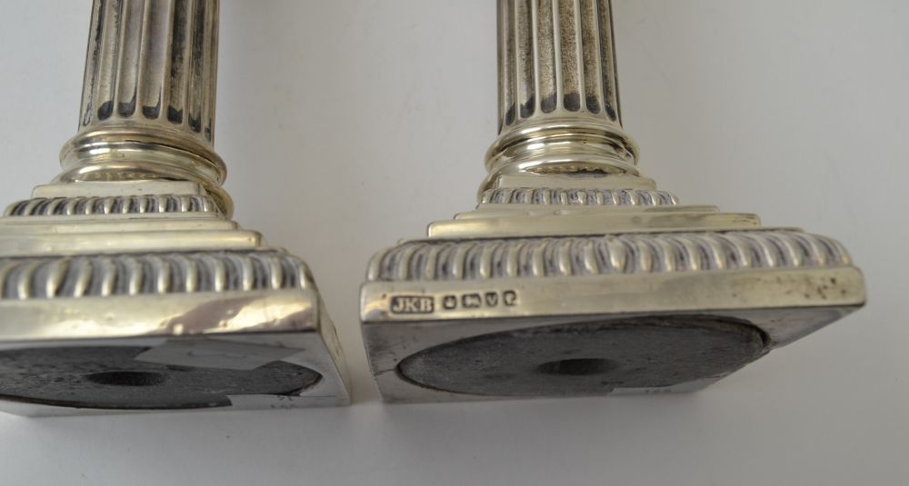 Hawksworth, Eyre & Co. Ltd, a set of four Victorian silver Corinthian column candlesticks, on squar - Image 2 of 3