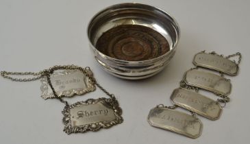 Mappin & Webb, A Georgian design silver wine coaster, Birmingham 1973, together with a set of four d
