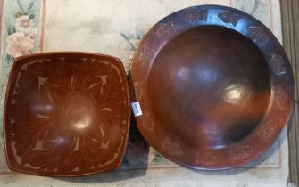 Two studio pottery bowls, one with impressed fish decoration to the rim, 45cm diameter, the other of