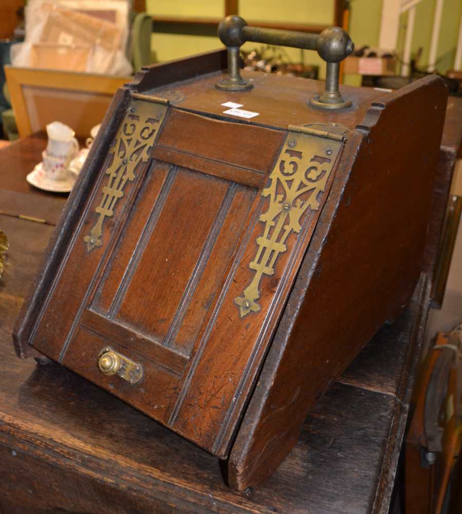 A 19th century oak brass bound coal box with original liner