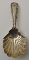 Josiah Williams & Co. A Victorian silver caddy spoon, with shell bowl, Exeter 1876