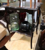 A square top occasional table with under tier