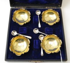 William Light, A cased set of four Victorian silver salts, with gilded interiors, Birmingham 1897, t