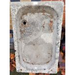 A carved limestone sink (garden planter) 86cm x 54cm