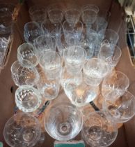 A box containing a selection of cut-glass drinking vessels