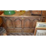 19th century oak 'Mule chest' having arched panelled front over two drawers
