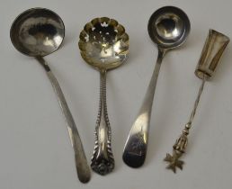 Two silver condiment ladles, a silver sifting ladle, and a Continental white metal scoop, with Malte