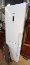 A Bosch upright fridge freezer in white