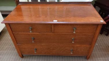 A low chest of two over three chest of drawers retailed by Lee Longland