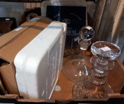 A box containing a large cut glass bowl, decanters and collectors plates