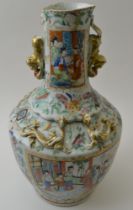 A late 19th century Canton Chinese porcelain vase painted in the famille rose palette, mounted with