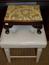 Two stools with pad tops