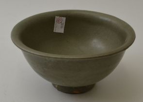 A Chinese celadon crackle glazed pottery bowl, in the Ming style, 15.5cm in diameter