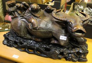Early 20th century Japanese wood carving of boys atop a water buffalo 56cm long