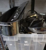 A large crate of culinary metal items