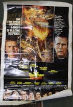 Film poster of The Towering Inferno, copyright 1974, Steve McQueen, Paul Newman, William Holden & Fa