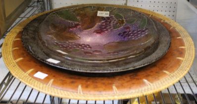 A large wooden bowl and two glass bowls