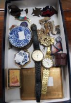 A selection of interesting gentlemen's collectibles including cap badges, medals etc