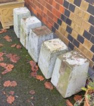 Five cast plinths