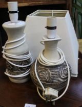 A pair of ceramic table lamps with shades