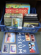 A box containing a selection of children's books and audio various