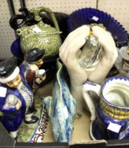 A box containing a mixed selection of collectible china and glass including an elephant