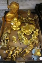 A box containing a selection of gold painted items