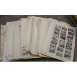 A box of many hundreds of stamps on album pages, World and Commonwealth