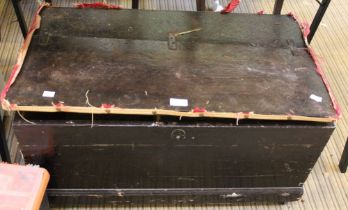A dark wood trunk in need of restoration