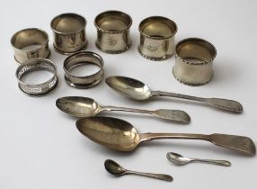 A set of three silver napkin rings, together with four assorted, various assay marks and styles, tog