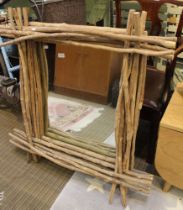 A rustic twig framed mirror