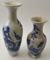 Two official / authorised Chinese ceramic vases, crackle glaze, with printed dragon decoration, the