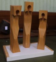 Rimas Metlovas 'Three Kings' a carved wooden group on a plinth base - 1999