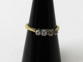 18ct four stone diamond ring (tested)