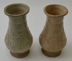 Two Chinese ceramic vases, tear drop form, each impressed, moulded, incised with floral decoration,