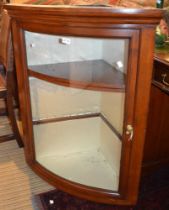 20th century glass bow front corner cupboard
