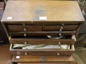 An engineers multi-drawer tool box with contents