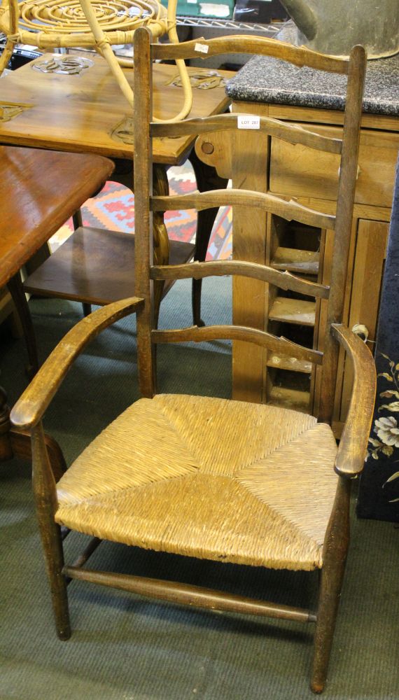 Late 19th century ladder back rush seated armchair