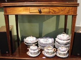 A mid-19th century mahogany flip top tea table, walnut inlaid